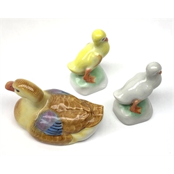 A Herend porcelain model of a Duck, together with two Herend Ducklings, each with printed mark beneath. 