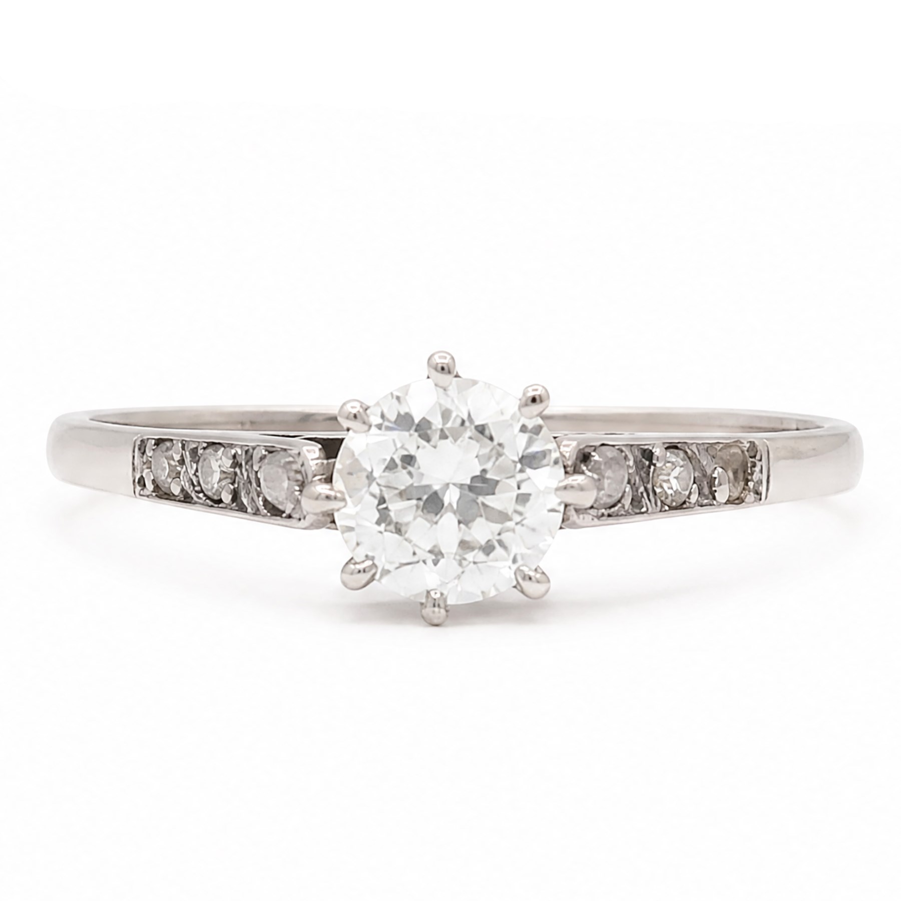 Early 20th century white gold and platinum diamond ring, eight claw set with a single old cut diamond of approx 0.70 carat and rose cut diamond shoulders, stamped PLAT 18ct