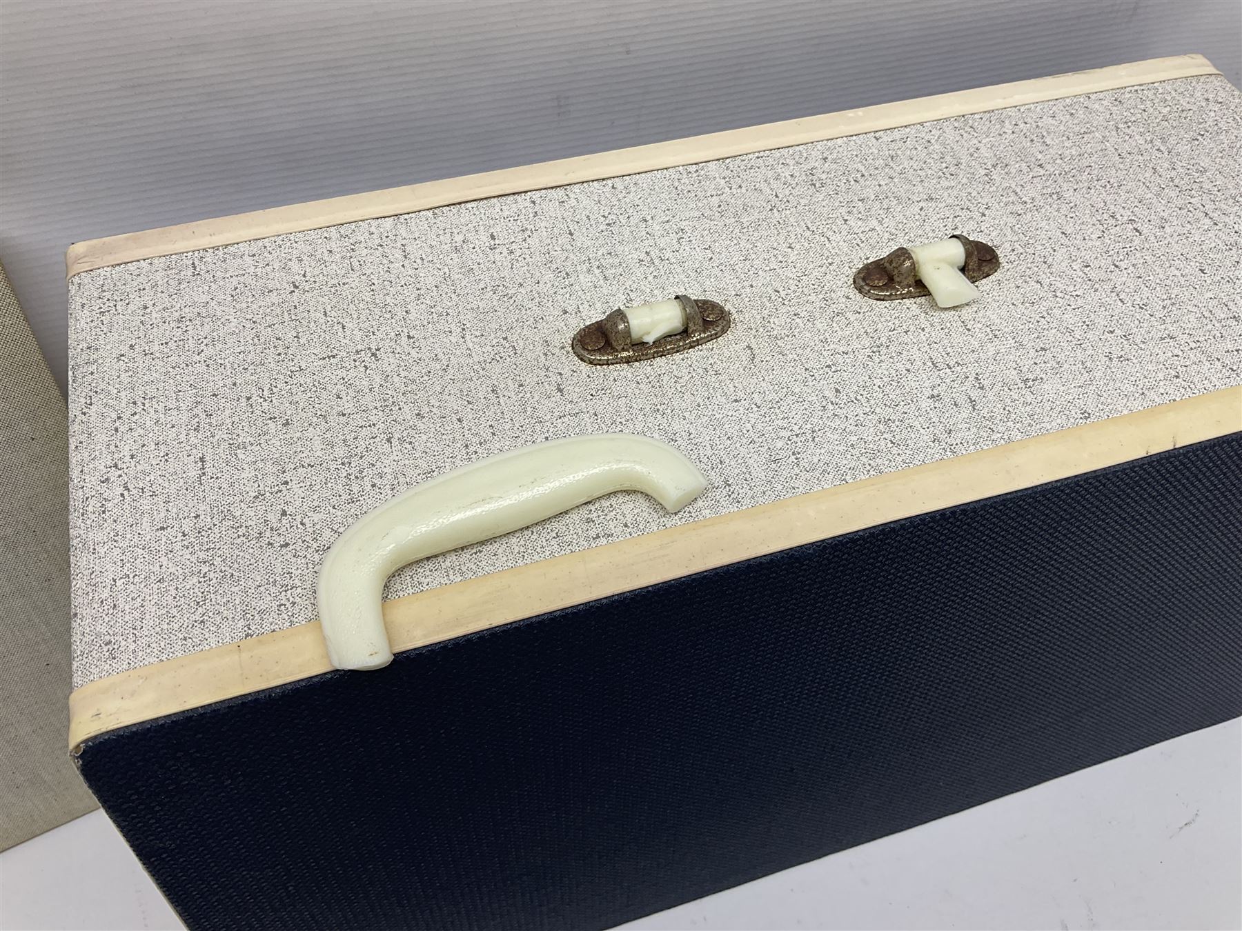 Seamstress sewing machine in case, together with a Singer sewing book