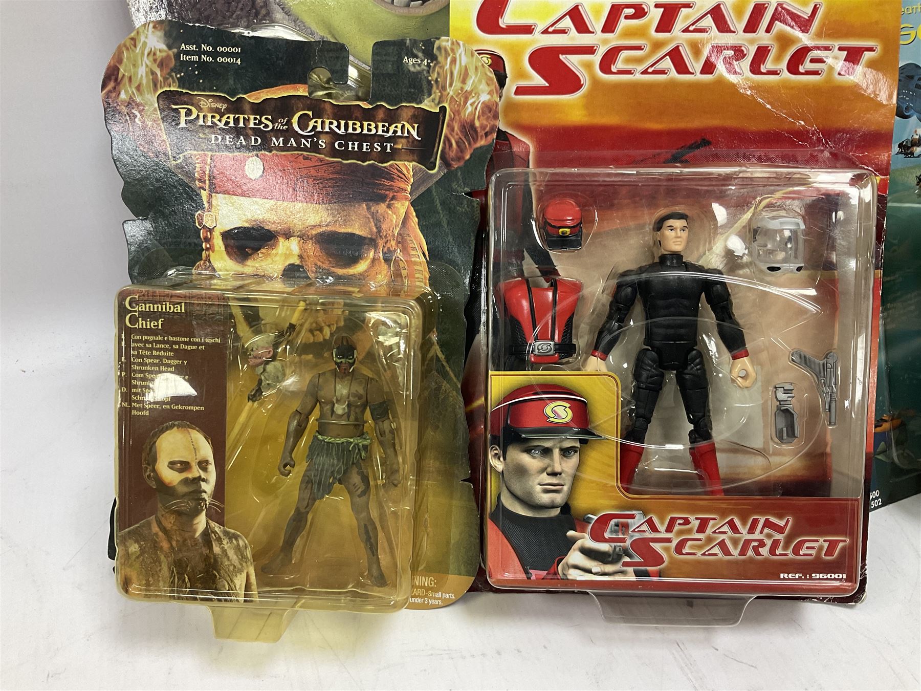 Seventeen TV & film related carded action figures comprising four Pirates of the Caribbean; five Shrek; three Star Trek; two Sea Quest DSV; Captain Scarlet, Warriors of Virtue; and Jurassic World; all in unopened blister packs (17)