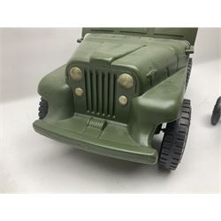 Action Man - five figures marked on the back 'Made in England by Palitoy under licence from Hasbro 1964', one dressed as a German Stormtrooper, one as a Red Devil Pilot and three in army uniform; another similar action figure marked to the right buttock ' G.I. Joe Copyright 1964 by Hasbro Patent Pending Made in Canada' dressed in army uniform; together with an Action Man jeep, field gun, mortar and machine guns and other accessories including helmets and weapons, parachute, diving equipment, skis and snow shoes, boots, uniforms etc; all unboxed