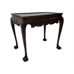 Late 19th to early 20th century mahogany side table, rectangular top with applied raised moulding, curved upper rails carved with C-scroll cartouches and extending curled leaves, bellflower carved cabriole supports with ball and claw feet 