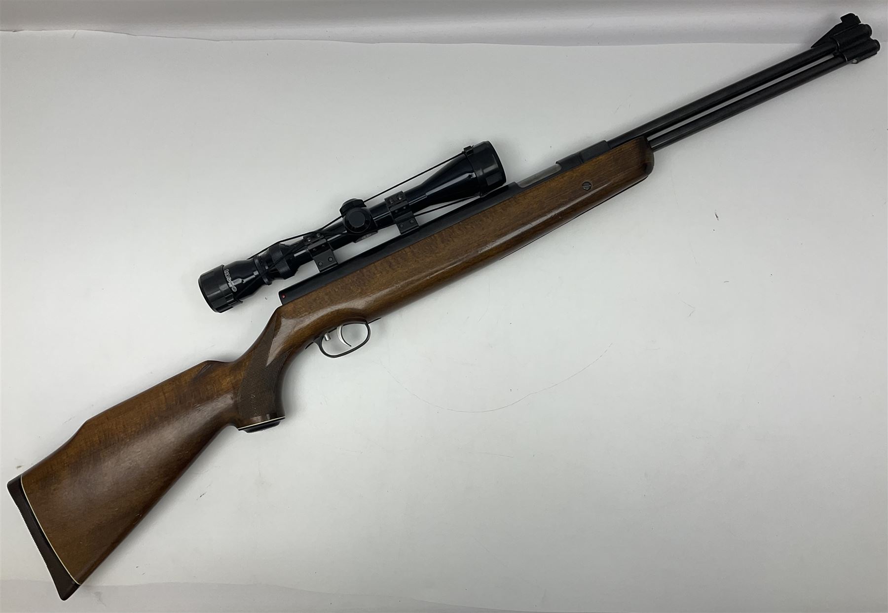 Weihrauch model HW 77 K  .22 air rifle with under lever action, beech stock with chequered pistol grip and Tasco WA39x40-1 scope, serial no.1283661 L102cm overall NB: AGE RESTRICTIONS APPLY TO THE PURCHASE OF THIS LOT