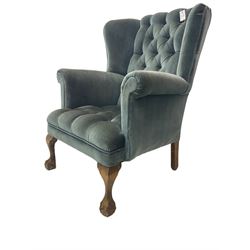 Georgian design wingback armchair, traditional shape with rolled arms, upholstered in teal velvet fabric, on cabriole supports with ball and claw feet