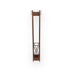 Contemporary mahogany coat and hat stand, tall rectangular form with eight hooks and decorative X-form lower supports