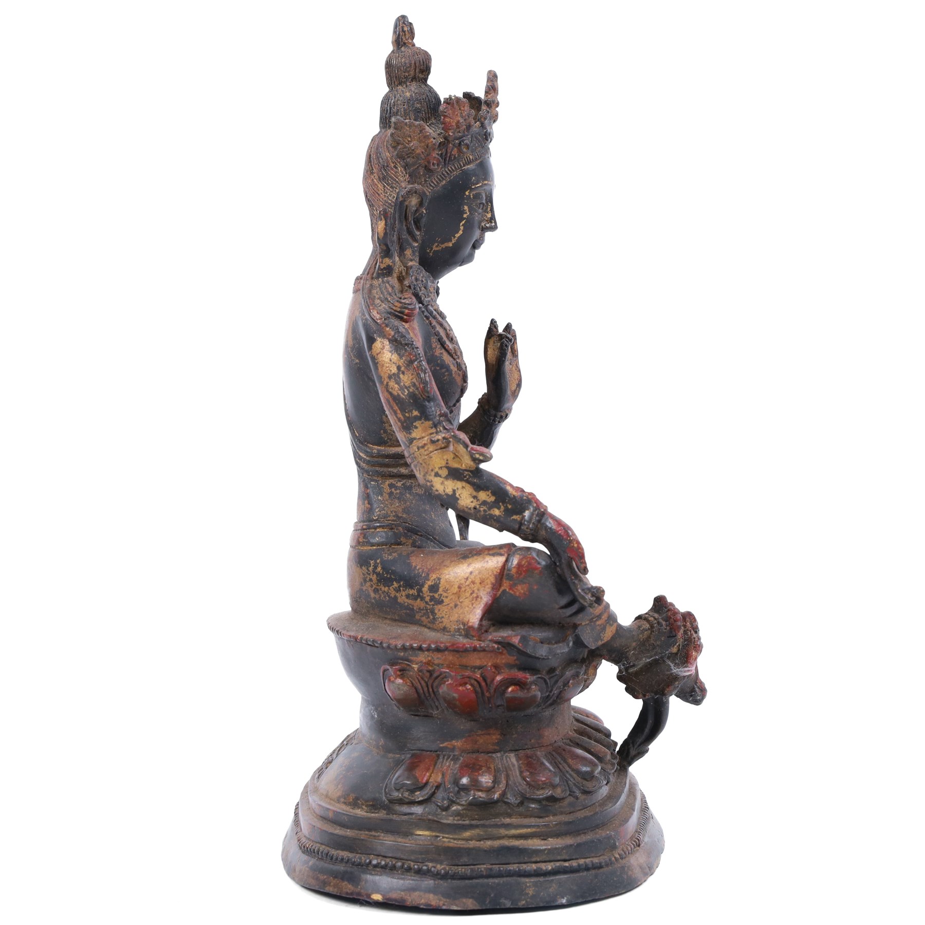 20th century bronzed buddha, with one hand raised, seated upon a lotus leaf, H27cm