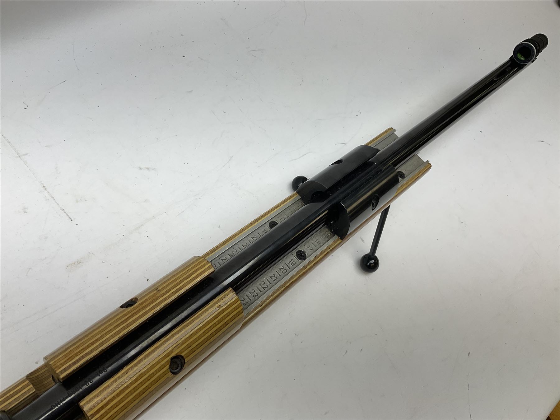 Feinwerkbau, Westinger & Altenburger Germany .22 LR bolt-action target rifle with 67cm barrel, fully adjustable weights and laminated stock, sliding weight rails and vernier rear sight; bi-pod rest at front; No.4225 L123.5cm overall SECTION 1 FIRE-ARMS CERTIFICATE REQUIRED       

