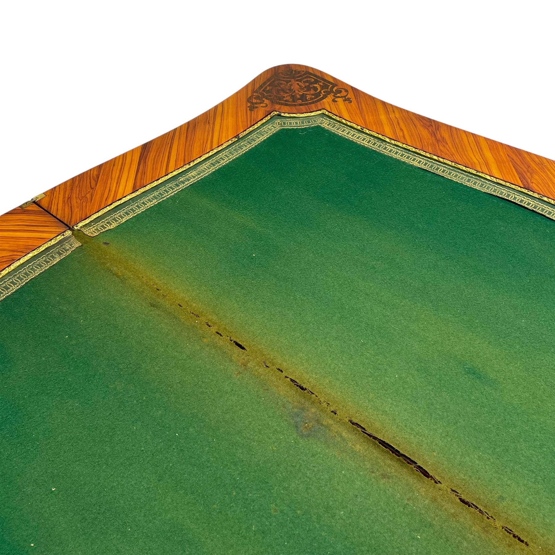 20th century French walnut and Kingwood card table, shaped fold-over top with figured quarter-matched veneers and floral egg and dart moulded edge in gilt metal, shaped aprons decorated with shell motifs with extending foliage, pull-out action base revealing storage well, on cabriole supports with ornate gilt metal mounts 