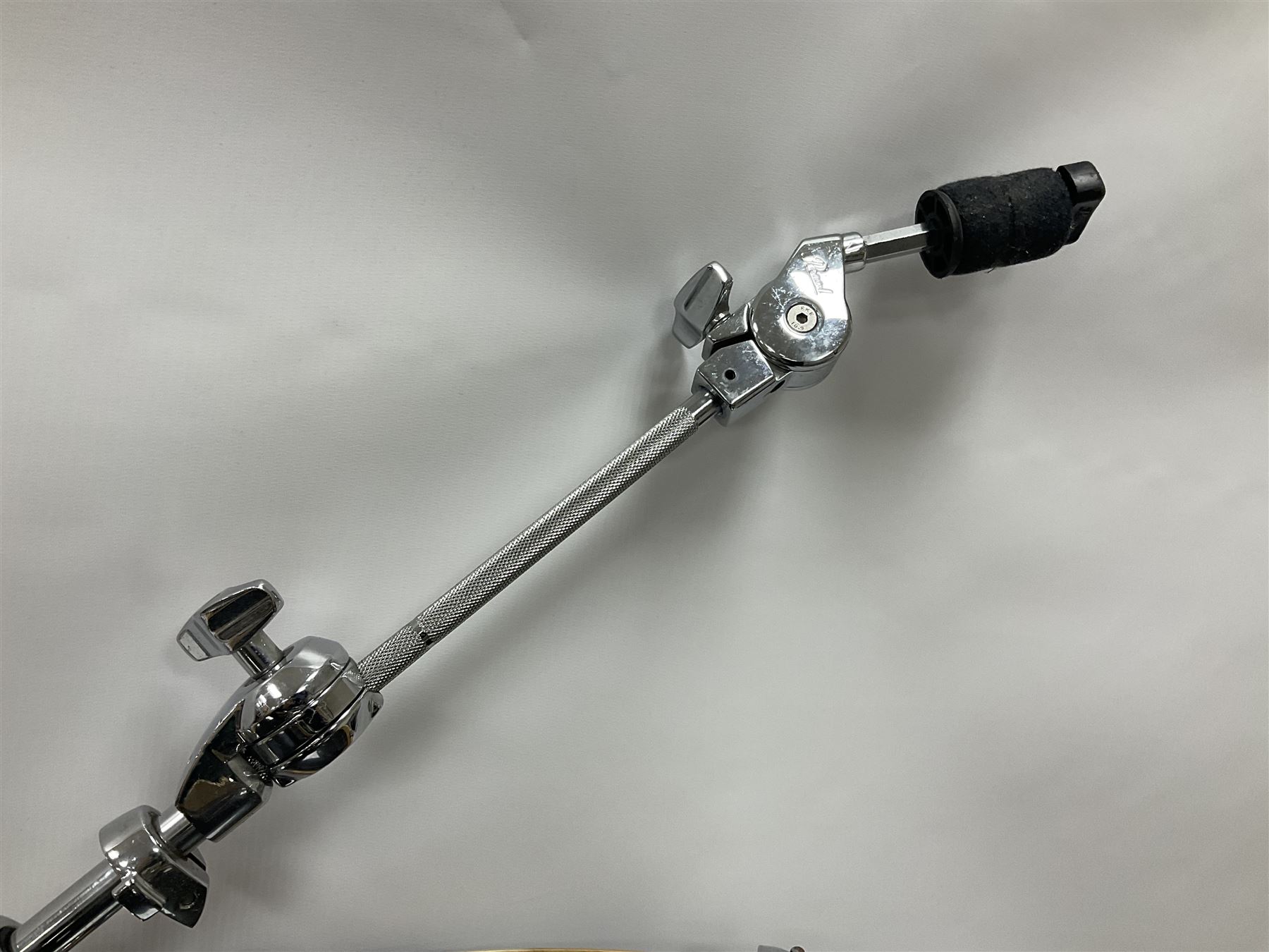 Pearl Vision SST Birch Ply shell four-piece drum kit in black comprising bass drum with foot pedal and three graduated toms; together with Pearl Custom Alloy Sensitone steel snare drum, drum and cymbal stands, microphone stand, stool and various drum sticks 