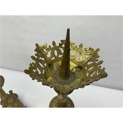 Pair of gilt metal pricket candlesticks, with applied decoration on knopt stems and triform bases, H47cm
