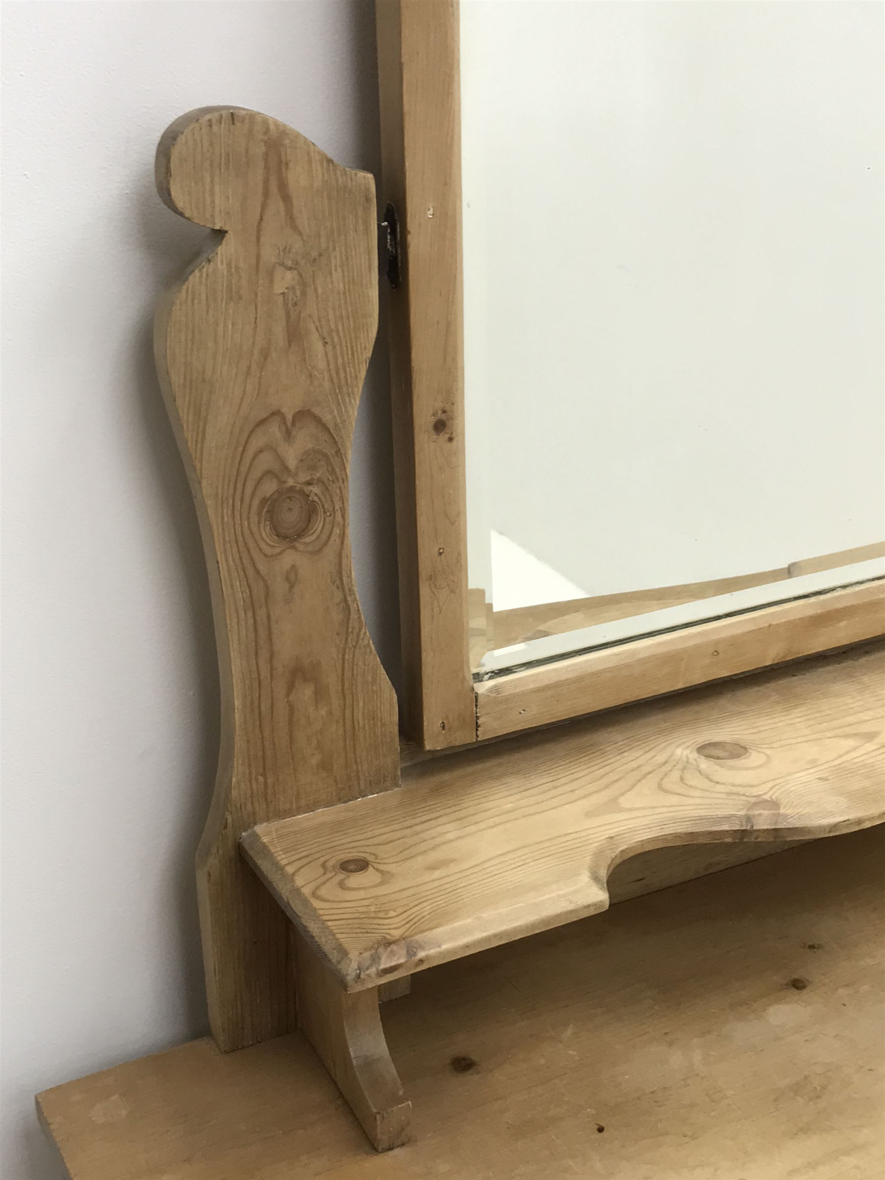 Victorian pine dressing table, raised shaped mirror back, single shelf, two short and two long drawers, shaped plinth base