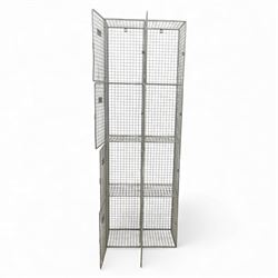Mid-20th century industrial wire mesh locker, comprising eight compartments with hinged doors and metal label plates, galvanised finish 
