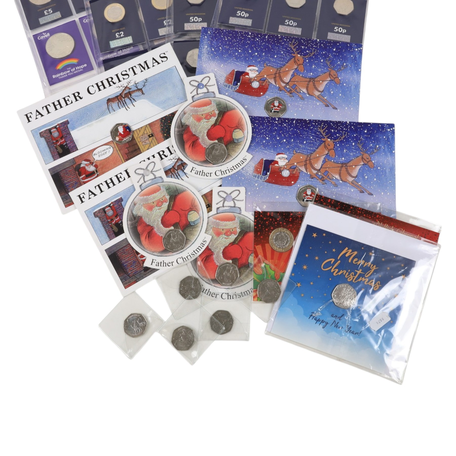 Mostly commemorative coins, including Queen Elizabeth II two pound and fifty pence coins on Change Checker cards, 'Prince Charles 70th Birthday Coin collection', etc