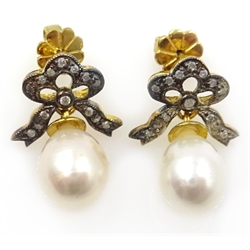  Pair of pearl and diamond bow ear-rings  