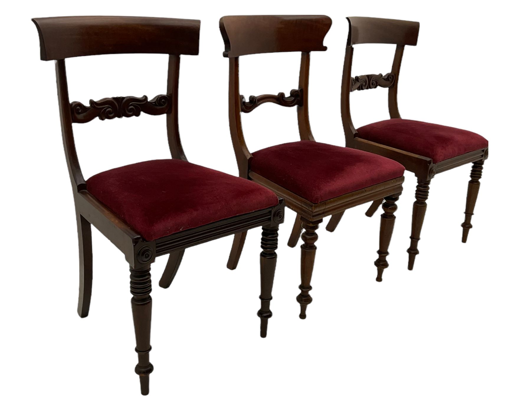 Seven early 19th century mahogany dining chairs - set six side chairs with scroll carved middle rails (W46cm), and a carver elbow chair with rope twist middle rail