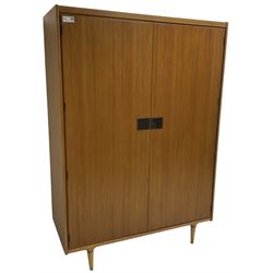 Wrighton - mid-20th century teak wardrobe, two doors enclosing hanging rail, shelves and hinged compartments, on turned tapering feet