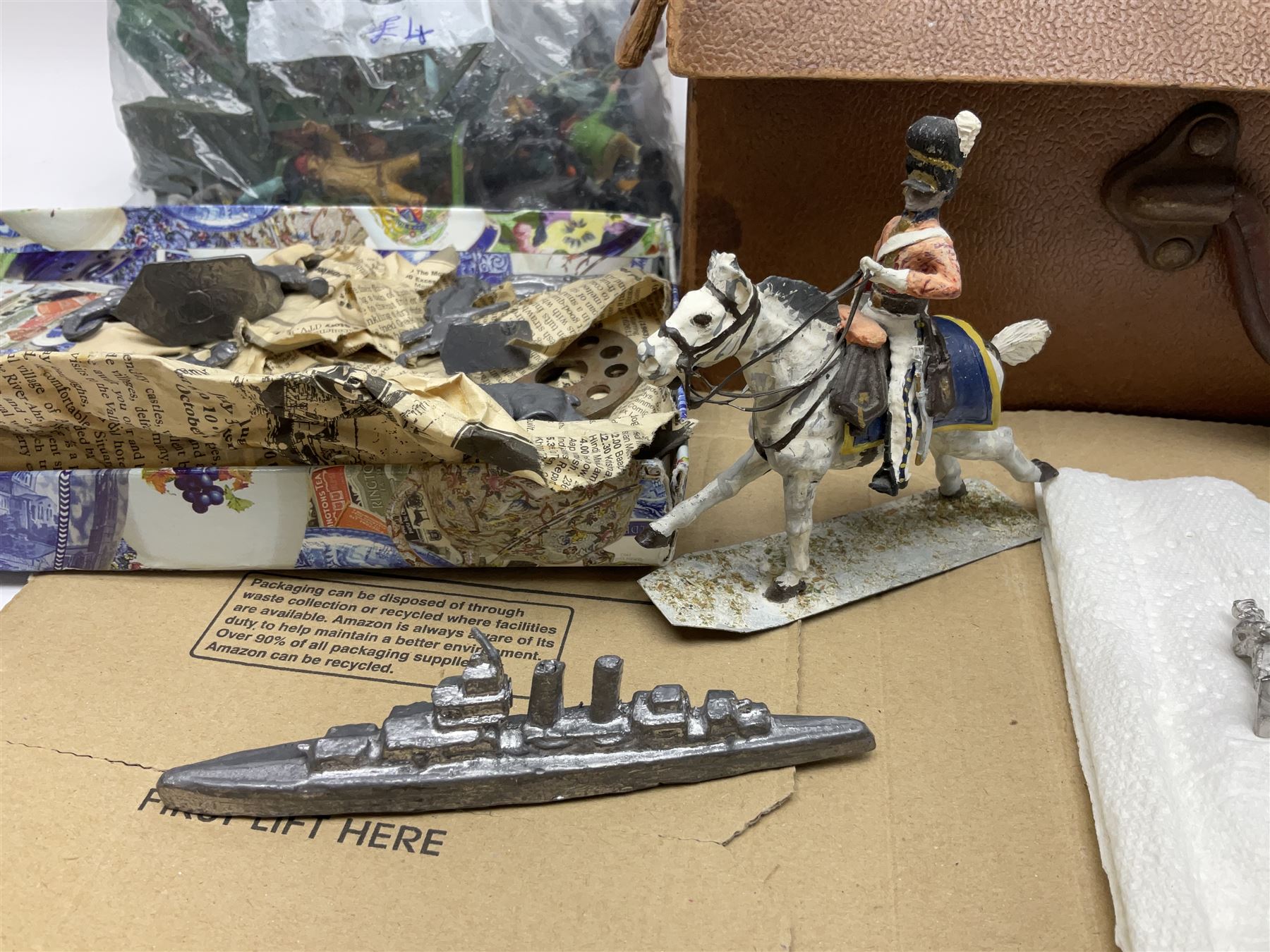 Large variety of predominantly metal miniature soldiers, a mixture of painted and non-painted figures, to include examples of American, British and European soldiers 