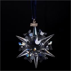 Nine Swarovski crystal snowflake Christmas ornaments, comprising years 1999-2005, 2010 and 2011, some with certificates, boxed (9)