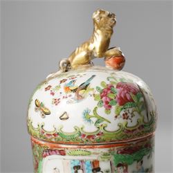 Cantonese famille rose vases, of inverted baluster form, the domed cover with gilt dog of Fu finial, H38cm; together with a further pair of Cantonese vases, each with double Buddhist lion handles and applied at the shoulders with chilong, H45cm (3)