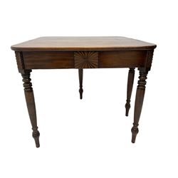 19th century mahogany tea table, rectangular fold-over top with rear gate-leg action, frieze applied with sunburst decoration, on turned supports