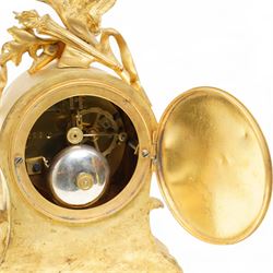 French-Ormolu and white marble mantle clock with garnitures, c 1910, with a white enamel dial and Arabic numerals, indistinct signature, pierced gilt-metal hands and minute markers, 8-day twin train countwheel striking movement, sounding the hours and half-hours on a bell, with a matching pair of two light candelabra. With pendulum and key.