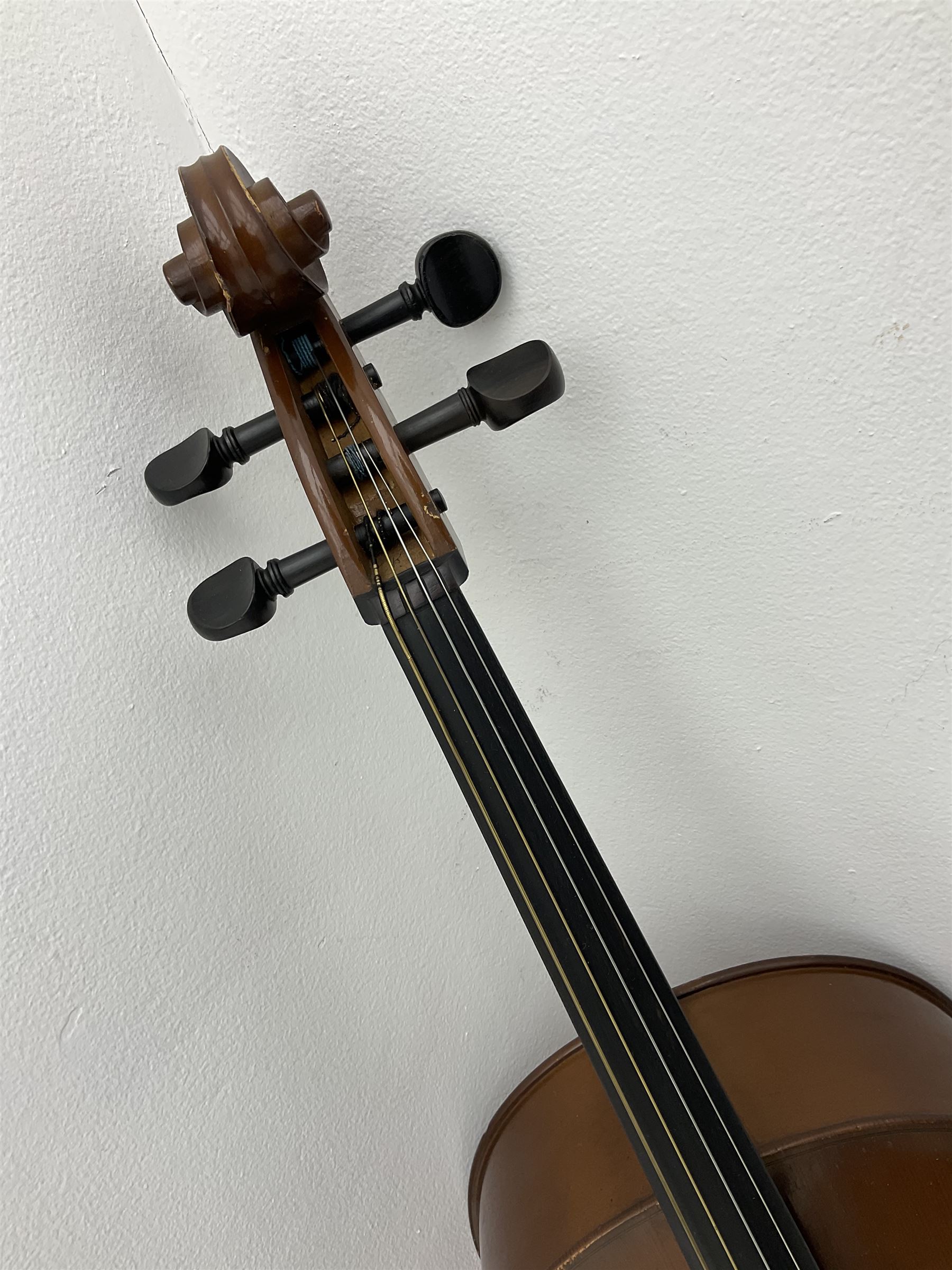 Modern Romanian student's three-quarter size cello with 70cm two-piece maple back and ribs and spruce top, bears label 'Musikinstrumentenfabrik Reghin Romania' L115cm overall