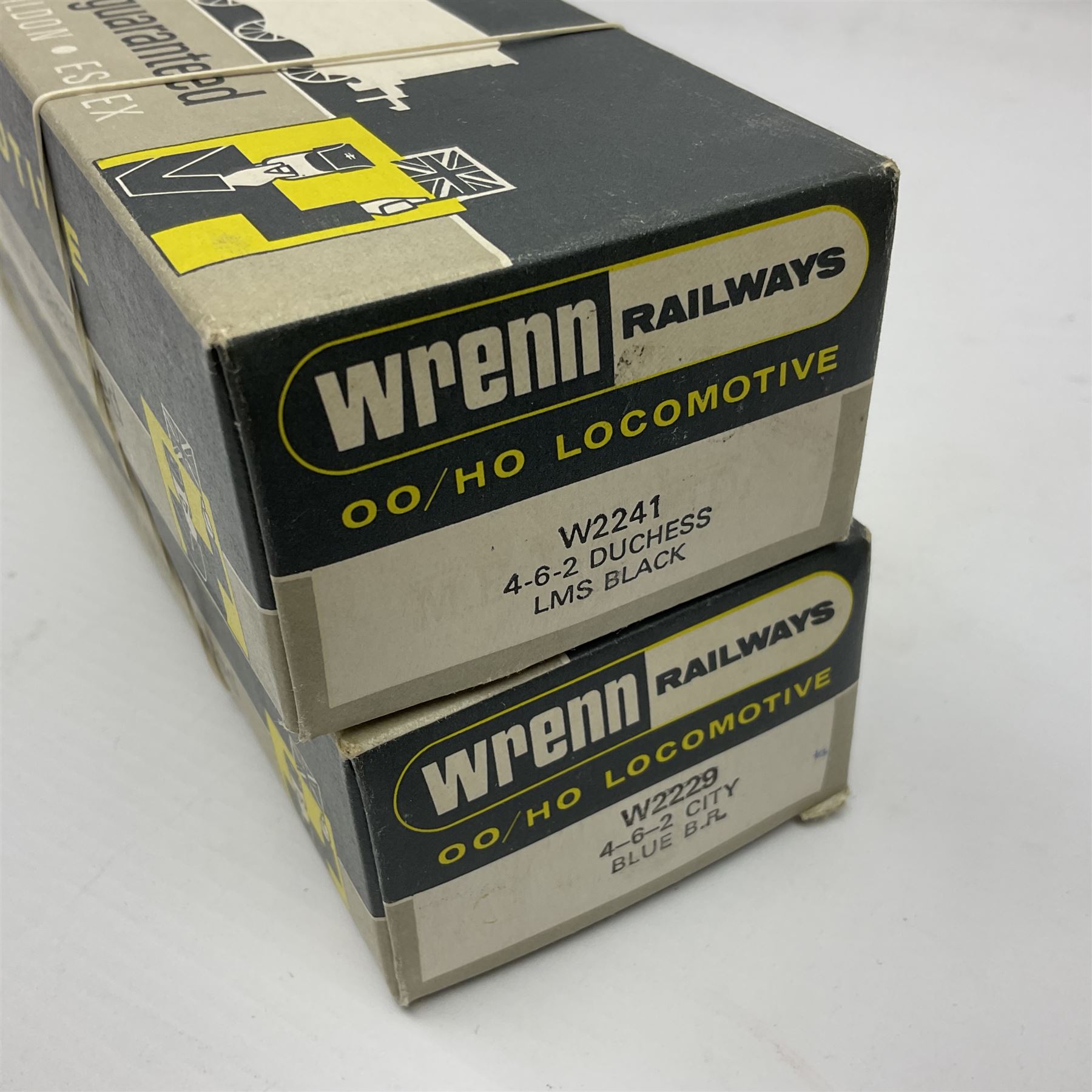 Wrenn '00' gauge - two Princess Coronation (Duchess) Class 4-6-2 locomotives - 'City of Glasgow' No.46242 in BR Blue; and 'Duchess of Hamilton' No.6229 in LMS Black; both boxed with instructions (2)