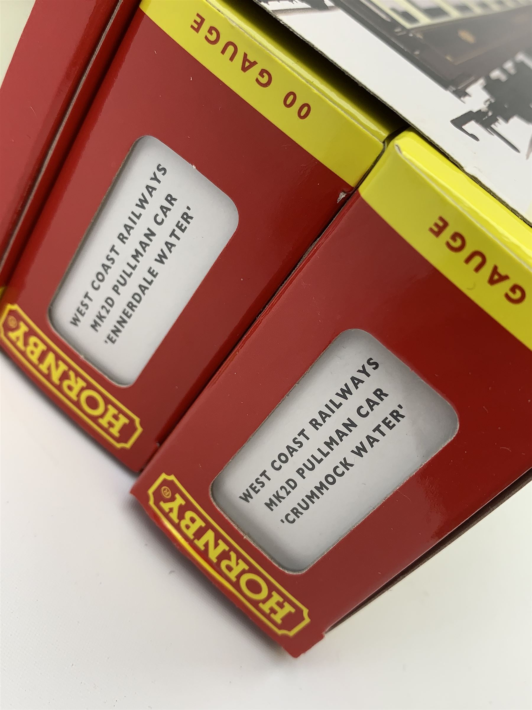 Hornby '00' gauge - 'West Coast Railways' Pullman train pack, three passenger coaches 'Crummock Water', 'Grasmere' and 'Ennerdale Water'; all mint and boxed in slip-case