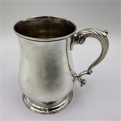 George II silver tankard, of waisted baluster form with acanthus capped C scroll handle, the body engraved with a lion rampant, upon a circular spreading foot, hallmarked Gabriel Sleath & Francis Crump, London 1754, H13cm