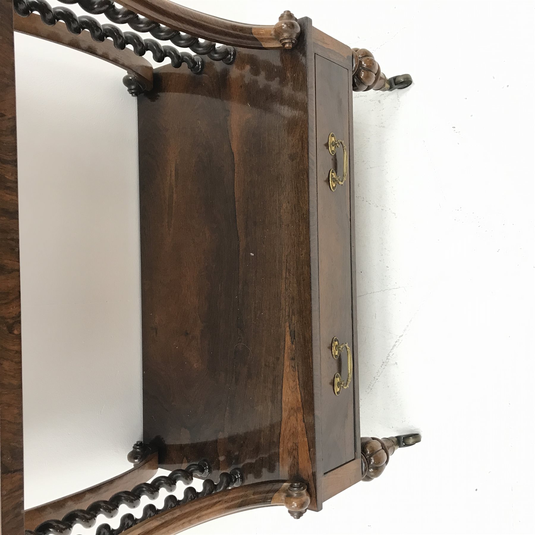 Victorian rosewood two tier etagere, scroll fretwork gallery back, carved elongated c scroll supports with scrolled terminals and barley twist supports, single drawer to base, turned and lobe carved feet with brass cups and castors, W77cm, H94cm, D36cm