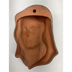 Art Deco Goldscheider terracotta wall mask, modelled as a woman in a black headscarf, model no 7831, with printed mark to back, H20cm 