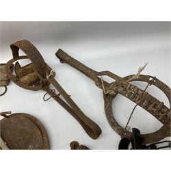 Quantity of animal traps including, gin traps, mole traps, Henri Marty wirework cage trap etc. Auctioneer's Note: These traps are sold as artefacts for ornamental purposes only as the use of some of them is illegal.