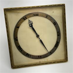 An early 20th century ivory desk clock, of square form, the silvered chapter ring with Roman numerals, with easel style support verso, laid flat H10.5cm.