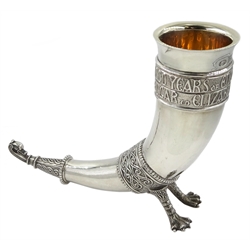 Silver commemorative Saxon drinking horn, the cornucopia inscribed in Celtic text with '1000 Years Of English Monarchy, Edgar to Elizabeth II AD 973-1973', dolphin head terminal and two claw supports by Albert Edward Jones, Birmingham 1973, H15cm