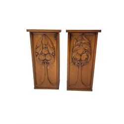 Pair Arts & Crafts carved oak cupboards, enclosed by door relief carved with stylised orange tree, each fitted with two shelves