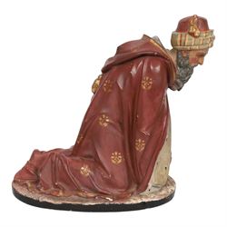 20th century painted plaster icon figure depicting one of the three wise men from a nativity sceen, kneeling and presenting his gift, H54cm 
