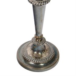 Pair of silver plated three branch candelabra, each with three urn-shaped sconces, with scroll arms, tapering stem upon a circular base, together with silver plated wine flagon