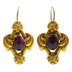 Pair of Victorian gold pendant earrings, each set with a cabochon garnet