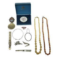 Assorted jewellery, to include Norwegian silver and enamel butterfly brooch, stamped Sterling 925S Norway, two silver bangles, one hallmarked, the other stamped Silver 925, an amber bead necklace, simulated amber necklace, etc., together with a mother of pearl folding fruit knife with hallmarked silver blade, brass caddy spoon, the terminal with enamel shield detailed Scarborough, and a boxed Bilston and Battersea Enamels box