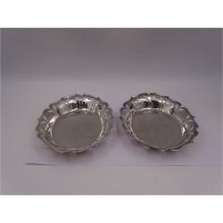 Pair of modern silver bon bon dishes, each of oval form with pierced sides and shaped rim, hallmarked A Chick & Sons Ltd, London 1967, L18cm, W13.5cm