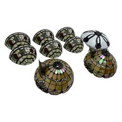 Collection of Tiffany-style light shades, to include six bowl-shaped wall-mounted fittings with floral and berry motifs and three ceiling-mounted light shades