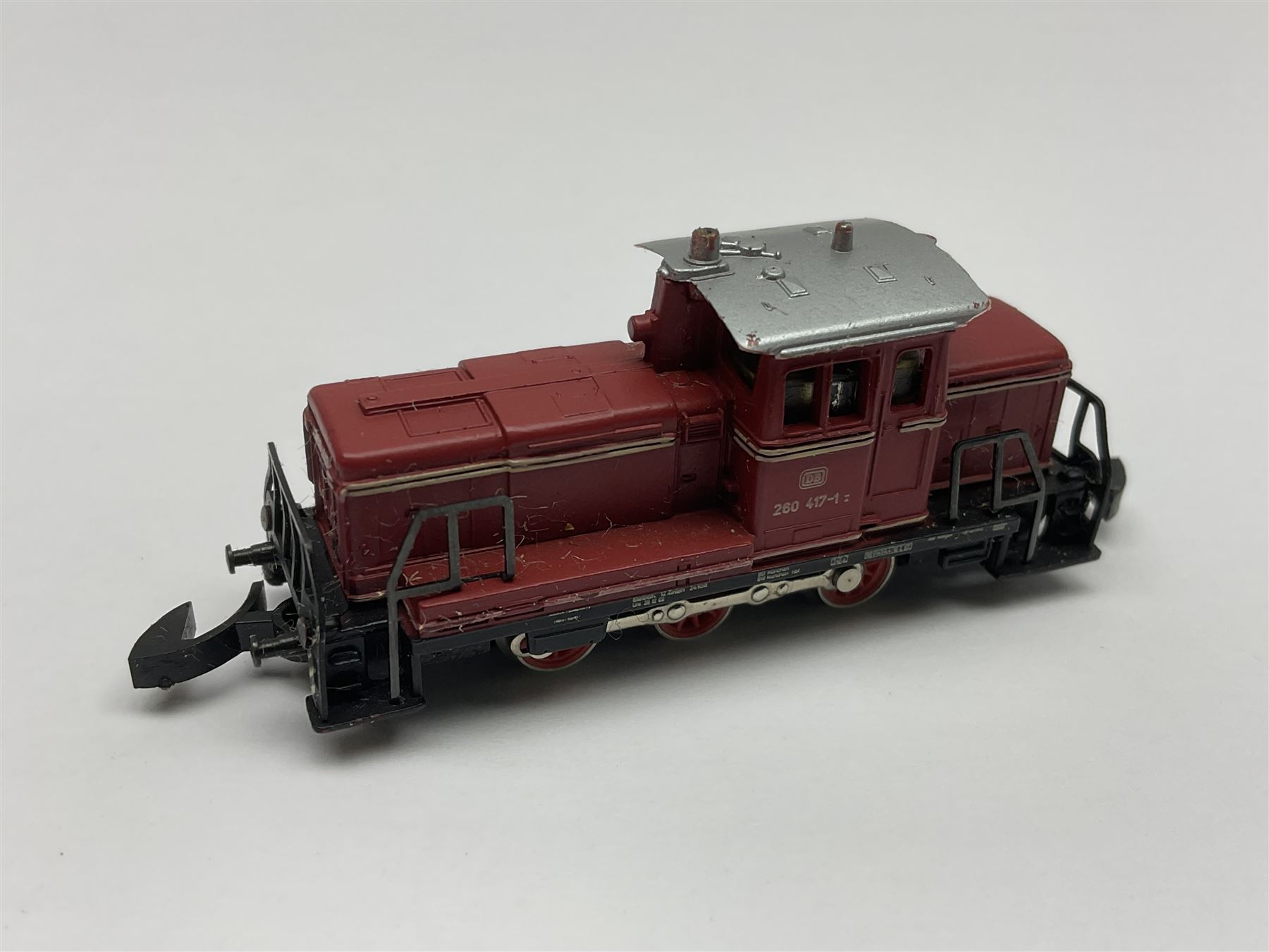 Marklin mini-club 'Z' gauge - DB Diesel Co-Co type locomotive; DB 0-6-0 Rangierlok type shuttle locomotive probably no.8864; and another DB 0-6-0 locomotive probably no.8800; together with an unmarked DB 4-6-2 tender locomotive and DB 2-6-0 tender locomotive; all unboxed (5)