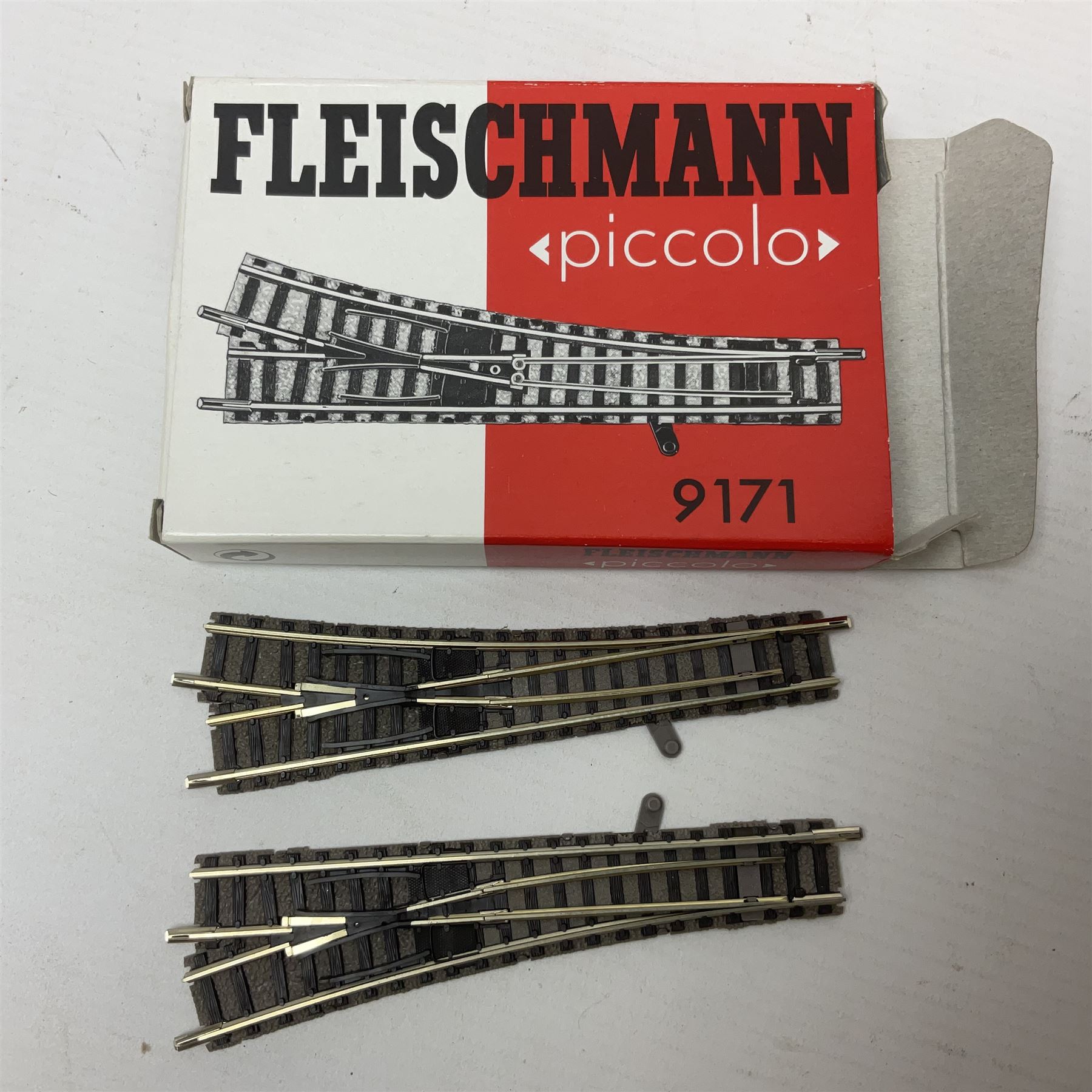 Fleischmann 'N' gauge - four-car set with double pantograph locomotive, dummy and two double decker coaches; No.825201 'Piccolo' three-piece wagon set; No.9198 'Piccolo' level crossing; No.9171 'Piccolo' points; and  No.KN35 Girder Bridge; all boxed
