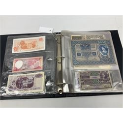 World banknotes, including Queen Elizabeth II The States of Jersey one pound 'DB202703', five pounds 'BB527762' and ten pounds 'AB651481', reserve bank of New Zealand two dollars '1L3 741894', King George V Straits Settlements one dollar 1st January 1935 'F/83 28924', various Bank of England notes etc, housed in two ring binder albums