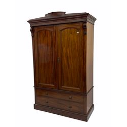 Late Victorian figured mahogany double wardrobe, two doors above two drawers