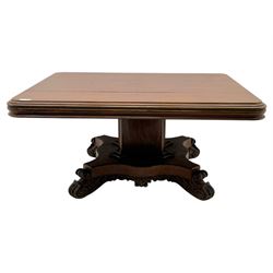 Victorian mahogany tilt-top table dining table, rounded tilt rectangular top with moulded edge, on octagonal column, raised on shaped quadriform base with bold scrolled feet
