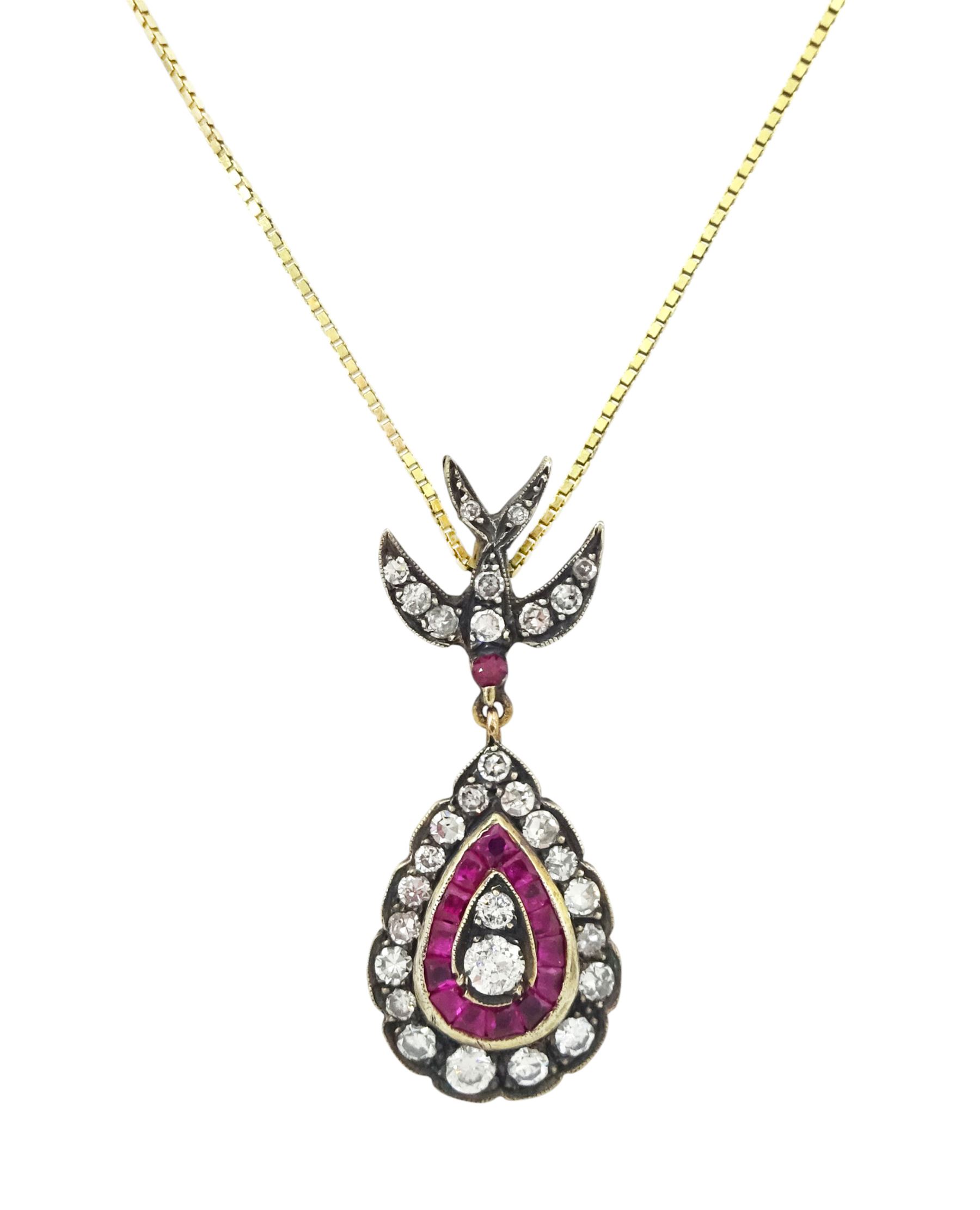 Gold and gold-plated diamond and ruby pendant necklace, the pear shaped pendant, milgrain set with round brilliant cut and single cut diamonds and calibre cut rubies, suspending from a ruby and diamond swallow bail, on a silver-gilt chain, total ruby weight 0.35 carat, total diamond weight 0.60 carat, with World Gemological Institute Report 