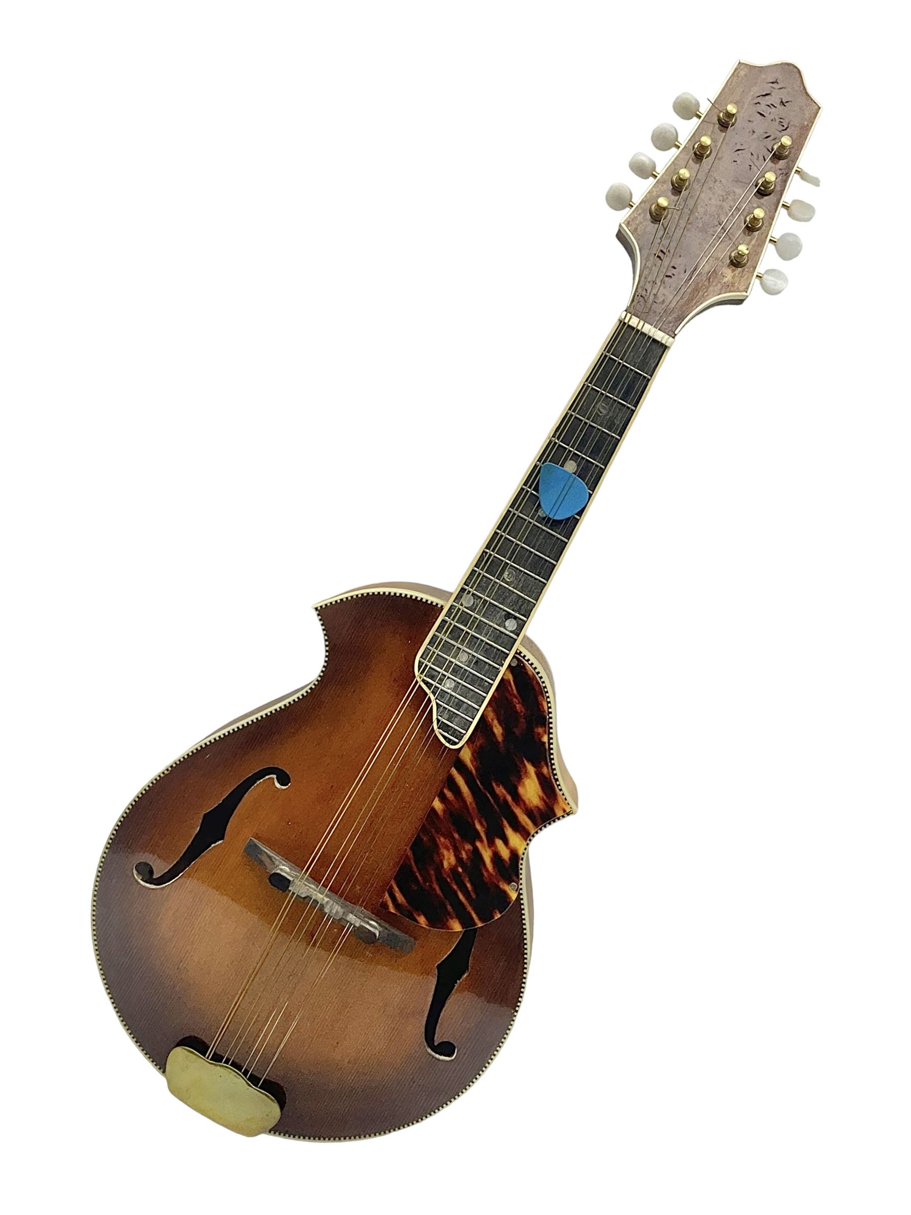 F-hole eight-string mandolin with one-piece maple back and ribs and spruce top L70cm