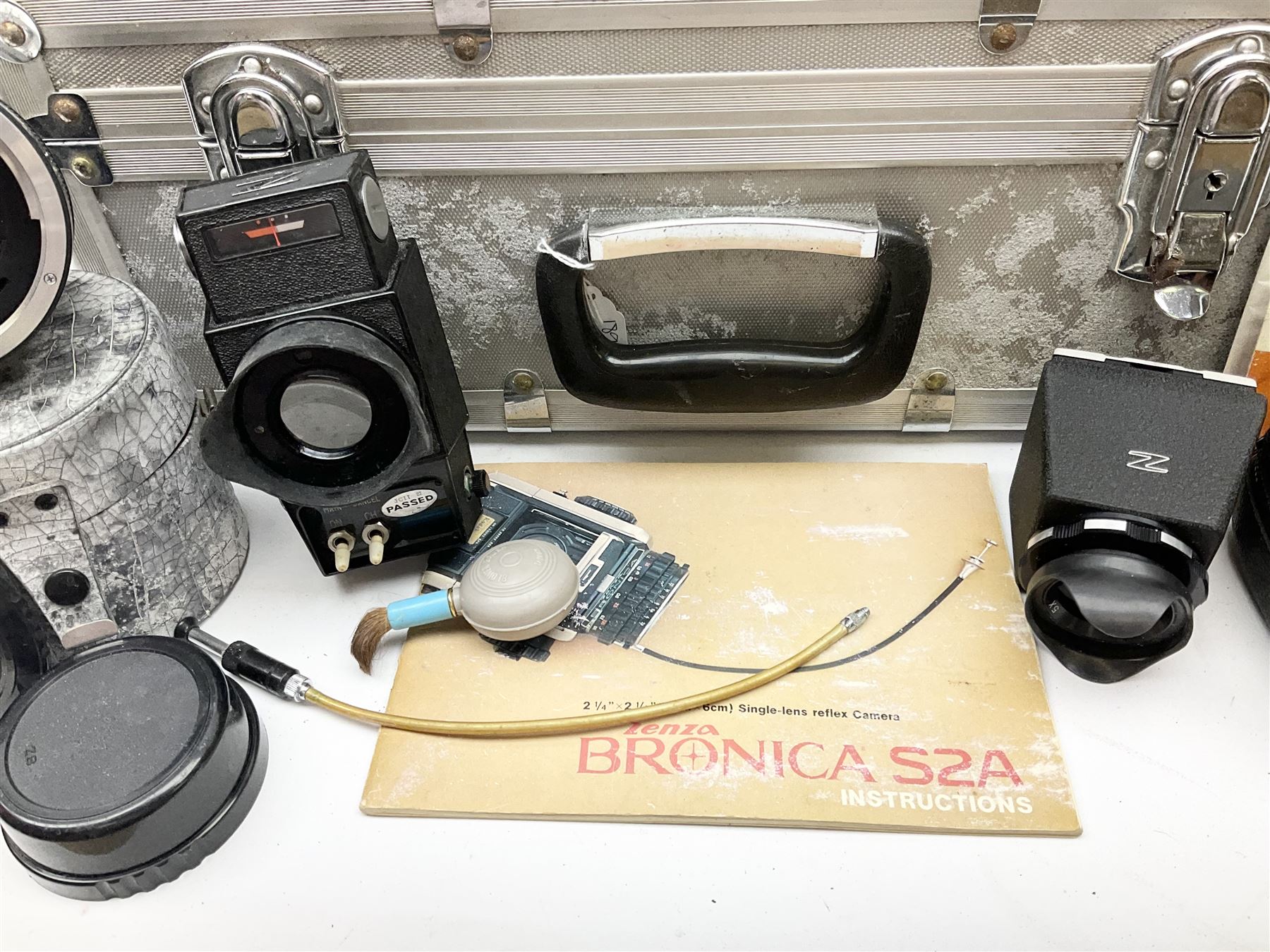 Zenza Bronica S2A medium format camera body, with Zenza Bronica Zenzanon MC '1:2.4 f-80mm' lens, together with Nippon Kogaku Nikkor-P '1:4 f-200mm' lens, Nikkor D.C '1:4 f-40mm' lens, two film backs and other camera equipment, housed in a hard flight case