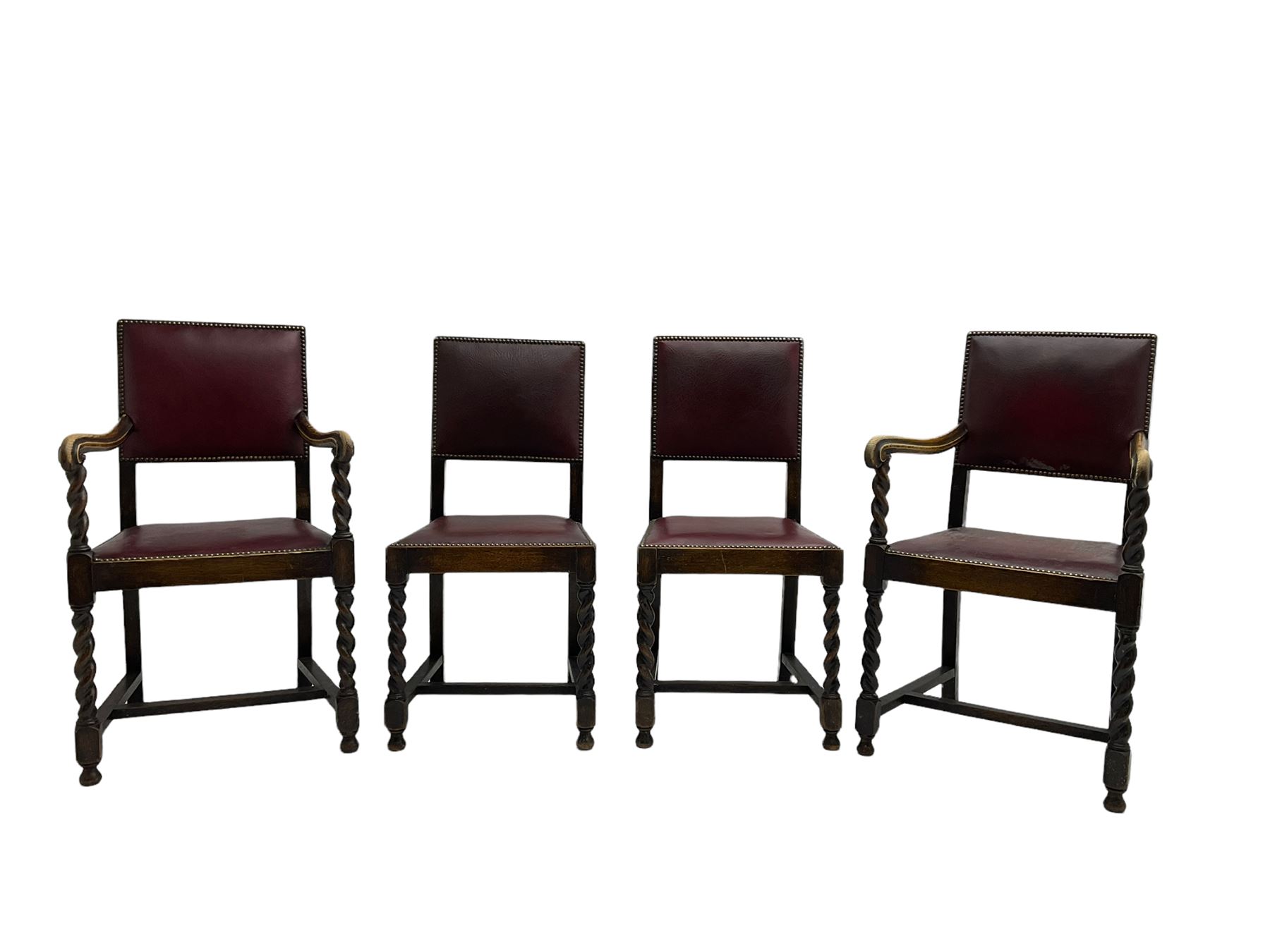 Set four early 20th century oak barley twist dining chairs, upholstered in burgundy leather with stud work, two carvers and two side chairs